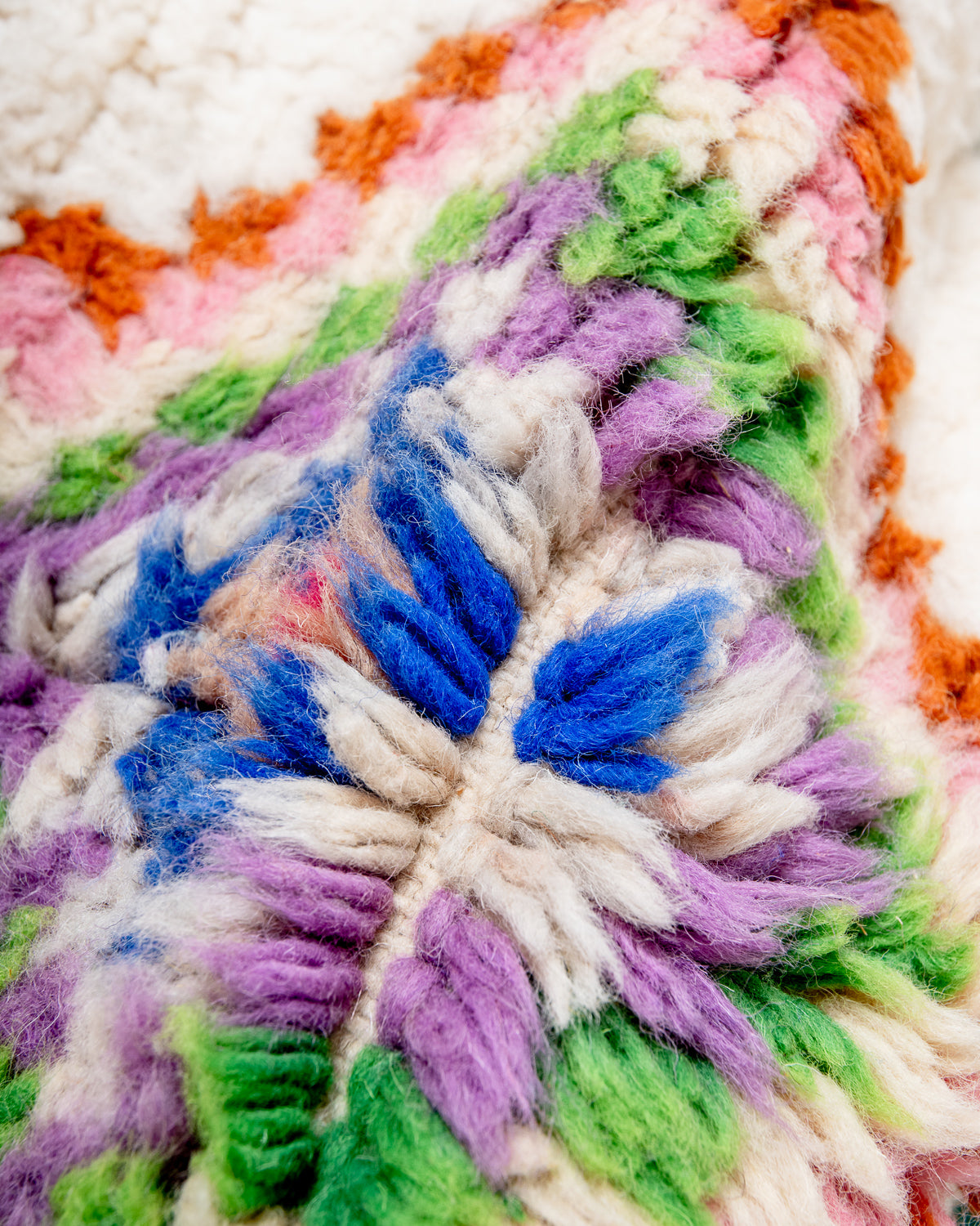 Modern, designer, handcrafted Berber rug from Morocco. Beniourain carpet with beautiful colours and patterns and fluffy wool texture.